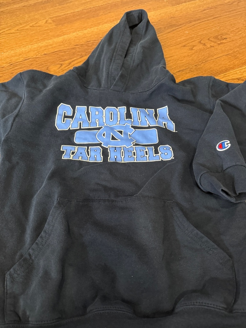 Champion Navy Hoodie with Carolina Tar Heels Blue Logo